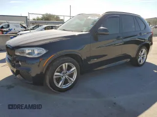 2015 BMW X5 xDrive35i with VIN 5UXKR0C57F0K59419, listed as a Copart auction lot 77048904 with 122,946 mi miles and Clean Title. Bid and sale history available at carsss.com. Image 1.