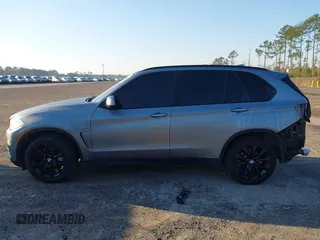 2016 BMW X5 xDrive40e with VIN 5UXKT0C57G0S75476, listed as a IAAI auction lot 41642249 with 105,489 mi miles and . Bid and sale history available at DreamBid. Image 15.