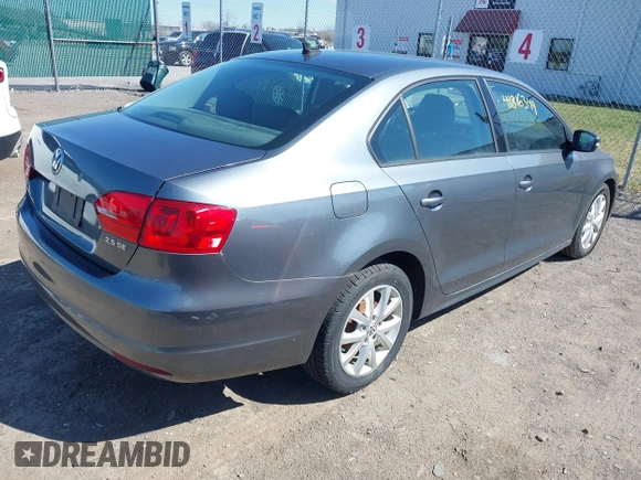 2011 Volkswagen Jetta SE with VIN 3VWBZ7AJ1BM027204, listed as a IAAI auction lot 41816349 with 152,028 mi miles and . Bid and sale history available at DreamBid. Image 4.