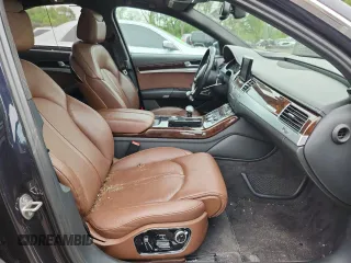2015 Audi A8 4.0T with VIN WAUJ2AFD6FN011009, listed as a Copart auction lot 64173005 with 153,377 mi miles and Salvage title. Bid and sale history available at DreamBid. Image 7.