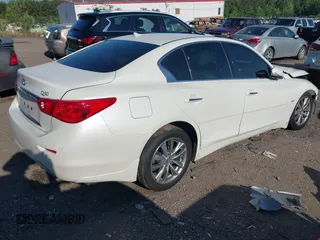 2017 Infiniti Q50 Premium with VIN JN1EV7APXHM737175, listed as a IAAI auction lot 42099700 with 91,200 mi miles and . Bid and sale history available at DreamBid. Image 4.