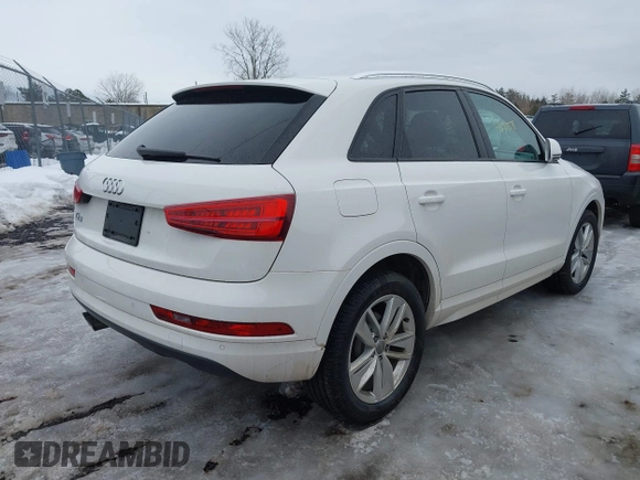 2017 Audi Q3 Premium z VIN WA1BCCFS4HR016424, wystawiony jako IAAI lot #41627278 z przebiegiem 60 028 mil mil oraz . Historia ofert i sprzedaży dostępna na DreamBid. Obrazek 4.