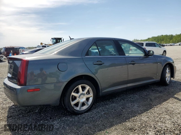 2007 Cadillac STS z VIN 1G6DW677870121149, wystawiony jako Copart lot #53341775 z przebiegiem 110 590 mil mil oraz Szkody całkowita. Historia ofert i sprzedaży dostępna na DreamBid. Obrazek 3.