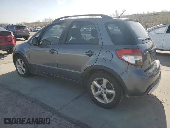 2009 Suzuki SX4 AWD z VIN JS2YB413895101919, wystawiony jako Copart lot #52235635 z przebiegiem 193 065 mil mil oraz Czysty tytuł • Clean title. Historia ofert i sprzedaży dostępna na DreamBid. Obrazek 2.
