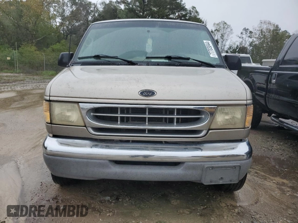 2001 Ford Econoline Passenger XL with VIN 1FBSS31LX1HA23564, listed as a Copart auction lot 77703044 with 276,538 mi miles and Salvage title. Bid and sale history available at DreamBid. Image 5.