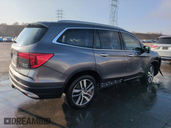 2017 Honda Pilot Touring with VIN 5FNYF6H95HB083610, listed as a Copart auction lot 50806045 with 200,897 mi miles and Salvage Title. Bid and sale history available at DreamBid. Image 3.