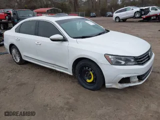 2016 Volkswagen Passat 1.8T SE w/Technology with VIN 1VWBS7A30GC013454, listed as a IAAI auction lot 41477109 with 134,027 mi miles. Bid and sale history available at carsss.com. Image 1.