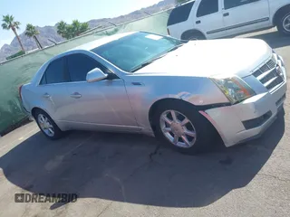 2009 Cadillac CTS RWD z VIN 1G6DU57VX90143820, wystawiony jako IAAI lot #42450086 z przebiegiem 170 656 mil mil oraz . Historia ofert i sprzedaży dostępna na DreamBid. Obrazek 13.