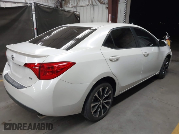 2017 Toyota Corolla L with VIN 5YFBURHE7HP693037, listed as a IAAI auction lot 42304020 with 117,710 mi miles and . Bid and sale history available at DreamBid. Image 4.