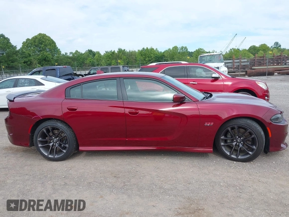 2020 Dodge Charger Scat Pack z VIN 2C3CDXGJ9LH112566, wystawiony jako IAAI lot #42330916 z przebiegiem 143 710 mil mil oraz . Historia ofert i sprzedaży dostępna na DreamBid. Obrazek 13.
