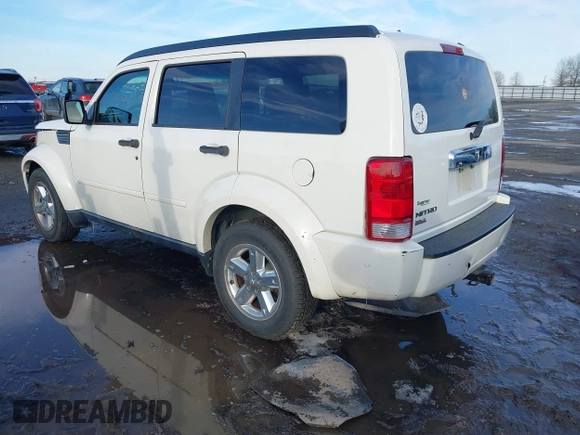 2008 Dodge Nitro SLT with VIN 1D8GT58K68W288772, listed as a IAAI auction lot 41621789 with 187,410 mi miles. Bid and sale history available at carsss.com. Image 3.