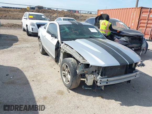 2012 Ford Mustang Premium with VIN 1ZVBP8AM5C5234532, listed as a IAAI auction lot 41860791 with 106,929 mi miles and . Bid and sale history available at DreamBid. Image 1.