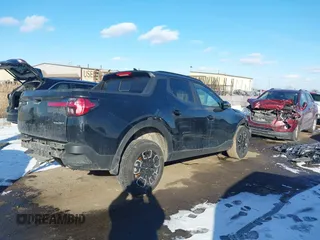 2022 Hyundai Santa Cruz SEL Premium z VIN 5NTJDDAF0NH037208, wystawiony jako IAAI lot #41536366 z przebiegiem 66 096 mil mil oraz . Historia ofert i sprzedaży dostępna na DreamBid. Obrazek 4.
