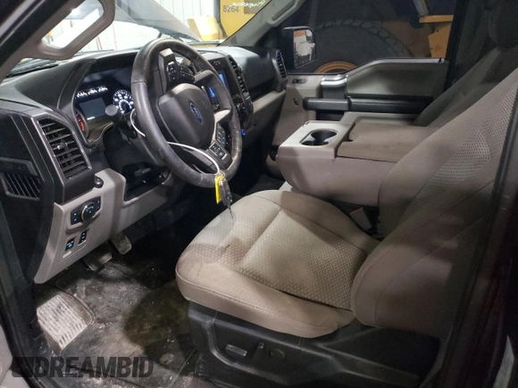 2020 Ford F-150 XL with VIN 1FTEW1EP2LKF10584, listed as a Copart auction lot 60520615 with 64,150 mi miles and Salvage title. Bid and sale history available at DreamBid. Image 7.