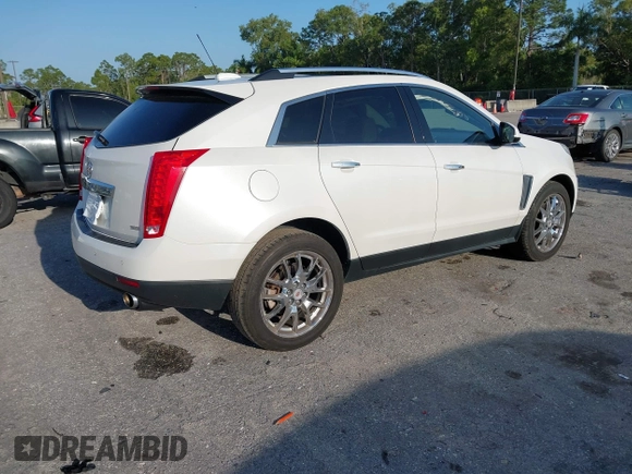 2015 Cadillac SRX Premium Collection with VIN 3GYFNDE32FS530357, listed as a IAAI auction lot 41976585 with 92,335 mi miles and . Bid and sale history available at carsss.com. Image 4.