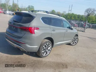 2021 Hyundai Santa Fe Calligraphy with VIN 5NMS5DAL8MH370726, listed as a IAAI auction lot 42099412 with 56,273 mi miles. Bid and sale history available at carsss.com. Image 4.