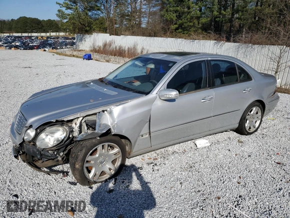 2003 Mercedes-Benz E-Class 5.0L with VIN WDBUF70J93A086939, listed as a Copart auction lot 87022834 with 0 mi miles and Salvage Title. Bid and sale history available at carsss.com. Image 1.
