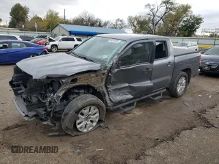 2023 Nissan Frontier Pro-4X z VIN 1N6ED1EK7PN613897, wystawiony jako Copart lot #80324384 z przebiegiem 21 701 mil mil oraz Szkoda całkowita • Salvage title. Historia ofert i sprzedaży dostępna na DreamBid. Obrazek 1.