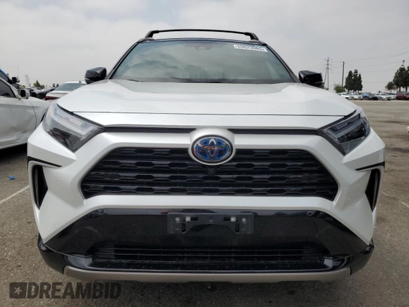 2024 Toyota RAV4 Hybrid XSE with VIN 4T3E6RFV0RU141591, listed as a Copart auction lot 59623085 with 27,682 mi miles and Salvage title. Bid and sale history available at DreamBid. Image 5.