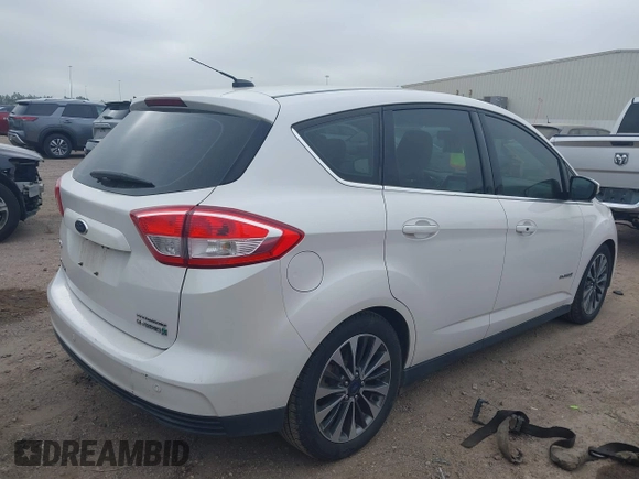 2018 Ford C-Max Titanium with VIN 1FADP5DUXJL104279, listed as a IAAI auction lot 41882275 with 55,137 mi miles and . Bid and sale history available at DreamBid. Image 4.