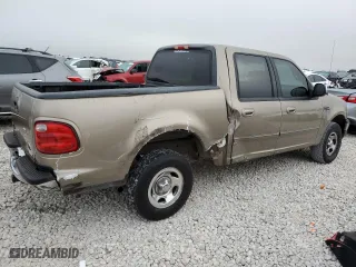 2001 Ford F-150 SuperCrew XLT with VIN 1FTRW07L21KF72022, listed as a Copart auction lot 69532204 with 205,793 mi miles and Salvage Title. Bid and sale history available at carsss.com. Image 3.