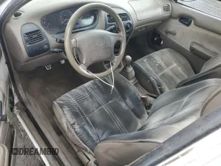 1996 Geo Prizm z VIN 1Y1SK5266TZ039172, wystawiony jako Copart lot #47487795 z przebiegiem 358 307 mil mil oraz Tytuł czysty. Historia ofert i sprzedaży dostępna na DreamBid. Obrazek 8.