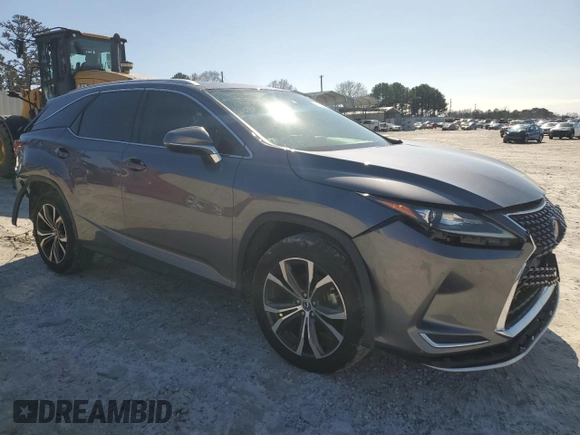2021 Lexus RX with VIN JTJHZKEA9M2019949, listed as a Copart auction lot 52738375 with 51,917 mi miles and Salvage Title. Bid and sale history available at carsss.com. Image 4.