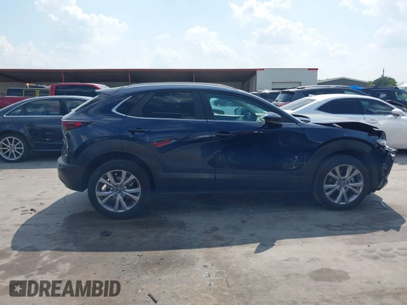 2023 Mazda CX-30 S Carbon Edition with VIN 3MVDMBCM4PM542160, listed as a IAAI auction lot 42175395 with 11,340 mi miles and . Bid and sale history available at DreamBid. Image 13.