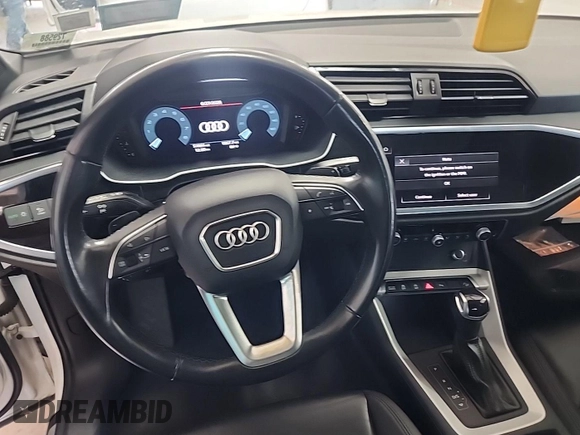 2023 Audi Q3 S line Premium with VIN WA1DECF37P1107583, listed as a IAAI auction lot 42708277 with 51,891 mi miles and . Bid and sale history available at DreamBid. Image 14.