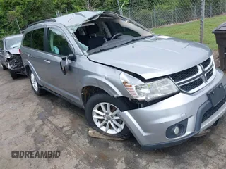 2017 Dodge Journey SXT z VIN 3C4PDCBG9HT523353, wystawiony jako IAAI lot #42273764 z przebiegiem 162 547 mil mil oraz . Historia ofert i sprzedaży dostępna na DreamBid. Obrazek 1.