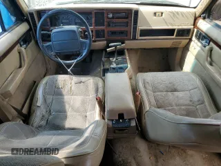 1995 Jeep Cherokee Country with VIN 1J4FJ78S4SL631318, listed as a Copart auction lot 63087634 with 295,577 mi miles and Salvage Title. Bid and sale history available at carsss.com. Image 8.