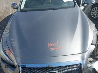 2014 Infiniti Q50 Sport with VIN JN1BV7AR3EM705555, listed as a IAAI auction lot 42221829 with 61,623 mi miles and . Bid and sale history available at DreamBid. Image 10.