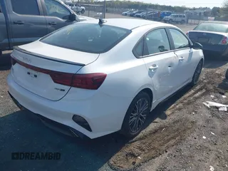 2023 Kia Forte GT-Line with VIN 3KPF54AD5PE563311, listed as a IAAI auction lot 42028015 with 54,900 mi miles. Bid and sale history available at carsss.com. Image 4.