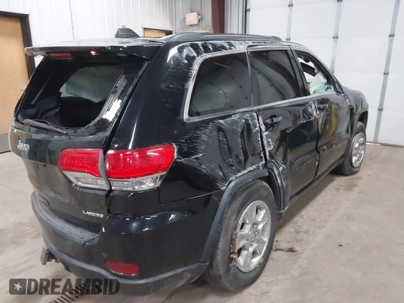 2017 Jeep Grand Cherokee Laredo with VIN 1C4RJFAG2HC625111, listed as a IAAI auction lot 42044571 with 148,533 mi miles and . Bid and sale history available at DreamBid. Image 4.
