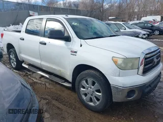 2010 Toyota Tundra with VIN 5TFEY5F10AX081909, listed as a IAAI auction lot 41745481 with 163,413 mi miles and . Bid and sale history available at DreamBid. Image 1.