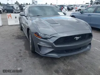2022 Ford Mustang EcoBoost with VIN 1FA6P8TH4N5144818, listed as a IAAI auction lot 41542310 with 18,973 mi miles. Bid and sale history available at carsss.com. Image 1.