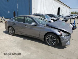 2019 Infiniti Q50 Luxe with VIN JN1EV7AR4KM558896, listed as a Copart auction lot 54249545 with 96,696 mi miles and Salvage title. Bid and sale history available at DreamBid. Image 4.
