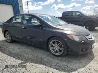 2010 Acura CSX Technology z VIN 2HHFD5F74AH201331, wystawiony jako Copart lot #57085814 z przebiegiem 149 905 mil mil oraz Szkody całkowita. Historia ofert i sprzedaży dostępna na DreamBid. Obrazek 4.