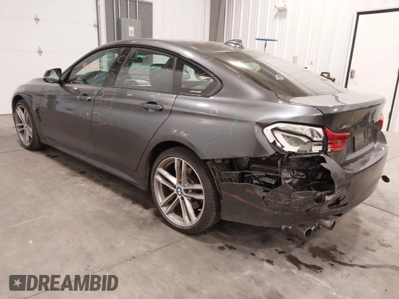 2018 BMW 4 Series 430i xDrive with VIN WBA4J3C52JBG95207, listed as a IAAI auction lot 41509392 with 68,193 mi miles and . Bid and sale history available at DreamBid. Image 3.