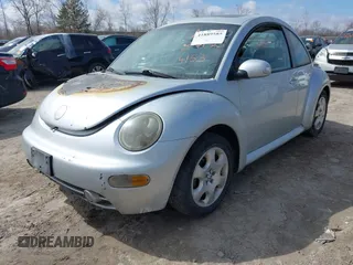 2003 Volkswagen New Beetle Coupe GLS with VIN 3VWCK21C53M433727, listed as a IAAI auction lot 41889585 with 214,144 mi miles. Bid and sale history available at carsss.com. Image 2.