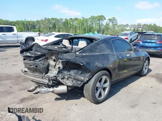2014 Ford Mustang V6 with VIN 1ZVBP8AM4E5228370, listed as a IAAI auction lot 42130306 with 113,015 mi miles. Bid and sale history available at carsss.com. Image 4.