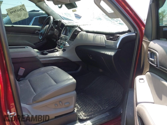2018 Chevrolet Tahoe LT with VIN 1GNSKBKC6JR215585, listed as a IAAI auction lot 42043898 with 85,730 mi miles and . Bid and sale history available at DreamBid. Image 5.