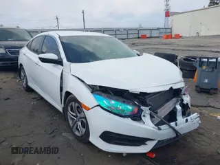 2017 Honda Civic Sedan LX with VIN 19XFC2F54HE039967, listed as a IAAI auction lot 41951897 with 106,660 mi miles. Bid and sale history available at carsss.com. Image 1.