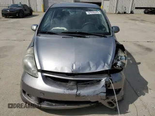 2007 Honda Fit Sport z VIN JHMGD38657S035465, wystawiony jako Copart lot #57635245 z przebiegiem 184 627 mil mil oraz Szkoda całkowita • Salvage title. Historia ofert i sprzedaży dostępna na DreamBid. Obrazek 5.