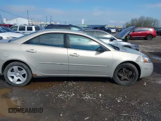 2009 Pontiac G6 1SA z VIN 1G2ZG57BX94154930, wystawiony jako IAAI lot #42205549 z przebiegiem 101 951 mil mil oraz . Historia ofert i sprzedaży dostępna na DreamBid. Obrazek 13.