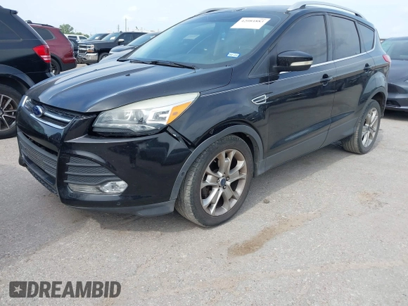 2014 Ford Escape Titanium with VIN 1FMCU0JX5EUB43194, listed as a IAAI auction lot 42084883 with 71,819 mi miles. Bid and sale history available at carsss.com. Image 2.