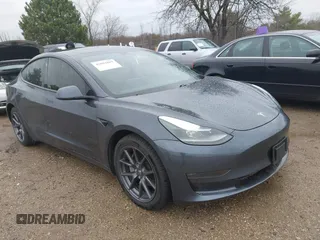 2021 Tesla Model 3 Long Range z VIN 5YJ3E1EBXMF988037, wystawiony jako IAAI lot #42084889 z przebiegiem Nie podano mil oraz . Historia ofert i sprzedaży dostępna na DreamBid. Obrazek 1.
