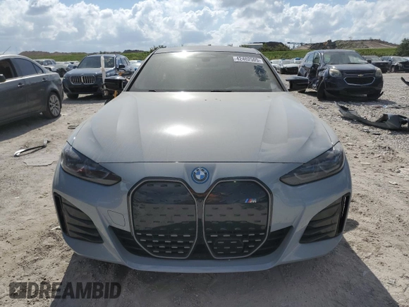 2023 BMW i4 M50 with VIN WBY33AW04PFP53795, listed as a Copart auction lot 42402505 with 20,210 mi miles and Salvage Title. Bid and sale history available at carsss.com. Image 5.
