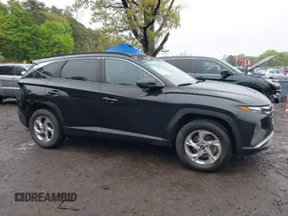 2022 Hyundai Tucson SEL z VIN 5NMJBCAE9NH015906, wystawiony jako IAAI lot #42169136 z przebiegiem 28 009 mil mil oraz . Historia ofert i sprzedaży dostępna na DreamBid. Obrazek 13.