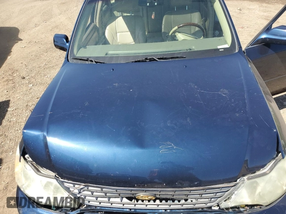 2004 Toyota Avalon XL z VIN 4T1BF28B84U342024, wystawiony jako Copart lot #56174985 z przebiegiem 166 173 mil mil oraz Szkoda całkowita • Salvage title. Historia ofert i sprzedaży dostępna na DreamBid. Obrazek 11.